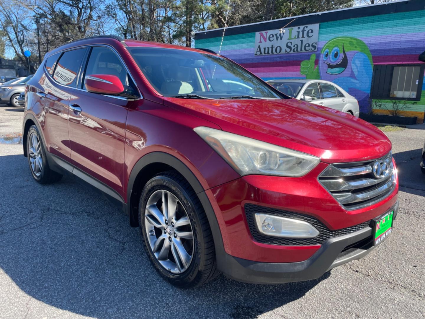 2013 RED HYUNDAI SANTA FE SPORT 2.0T (5XYZU3LA3DG) with an 2.0L engine, Automatic transmission, located at 5103 Dorchester Rd., Charleston, SC, 29418-5607, (843) 767-1122, 36.245171, -115.228050 - Leather, CD/AUX/Sat/Bluetooth, Dual Climate, Power Everything (windows, locks, seats, mirrors), Heated Seats, Rear Heated Seats, Push Button Start, Keyless Entry, Alloy Wheels. Local Trade-in!! Located at New Life Auto Sales! 2023 WINNER for Post & Courier's Charleston's Choice Pre-owned Car Dealer - Photo#0